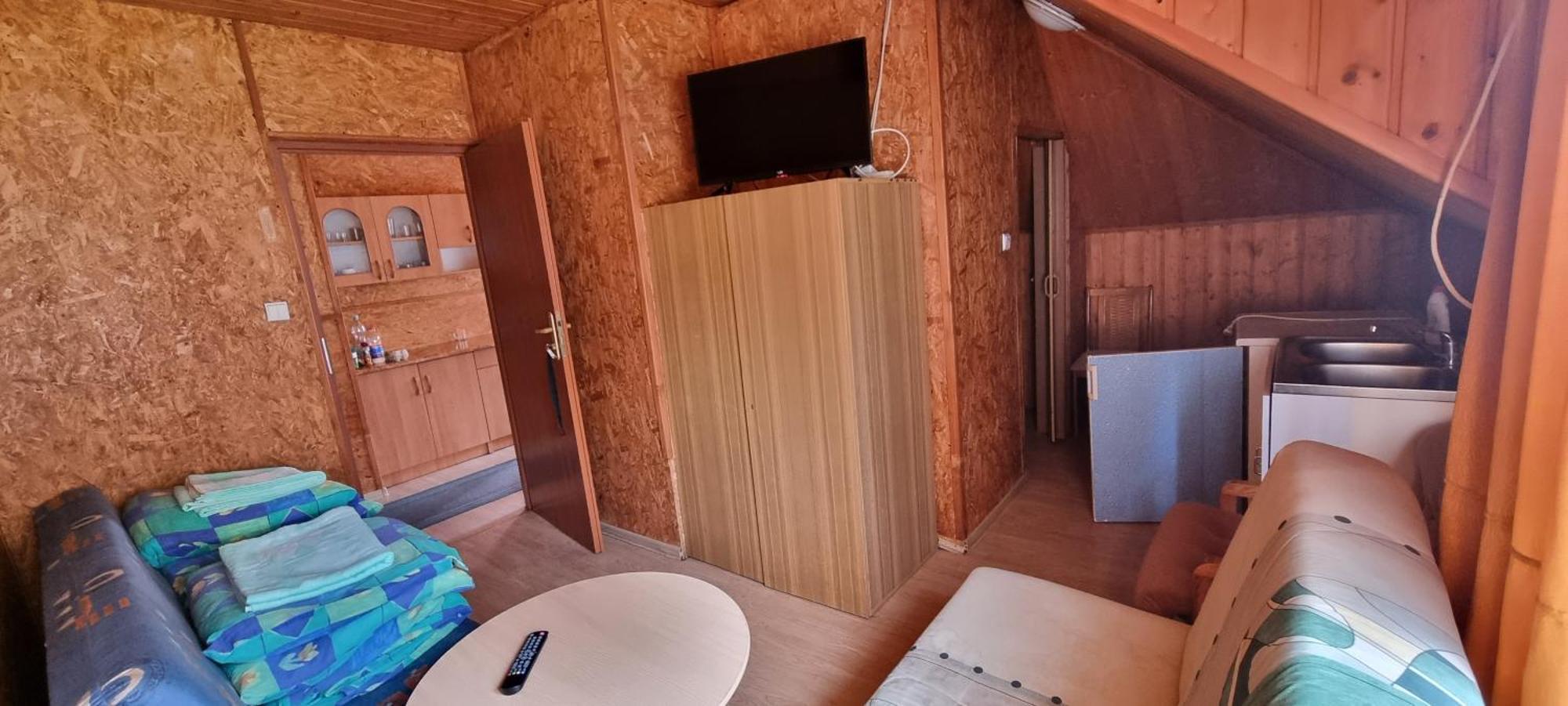 Pod Swierkami - *